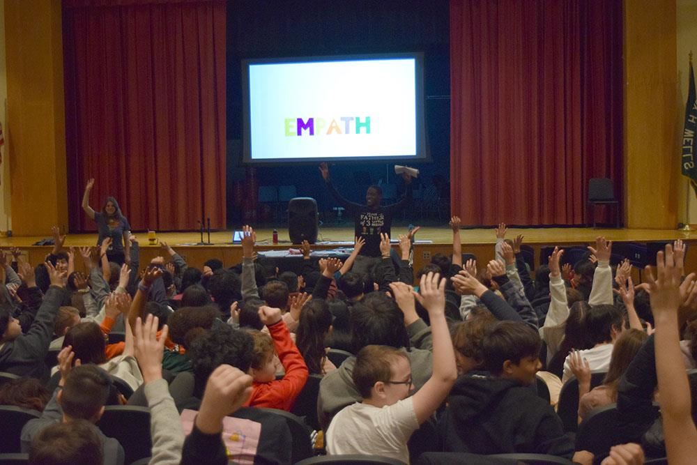 Speaker Nathan Smith addresses student at Wells during Respect for All week